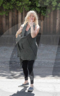 Goldie Hawn is very cheerful while doing some solo shopping in Brentwood