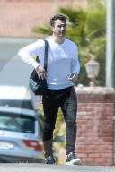Kevin Jonas is seen chatting on his phone as he arrived at at a friends house in Los Angeles. 