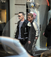 Milan, Elton John and husband David Furnish shopping downtown