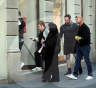 Milan, Elton John and husband David Furnish shopping downtown