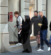 Milan, Elton John and husband David Furnish shopping downtown