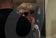 Milan, Elton John and husband David Furnish shopping downtown