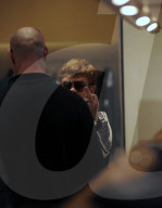 Milan, Elton John and husband David Furnish shopping downtown