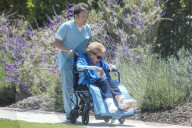 Kirk Douglasâ€™s wife of 64 years, Anne Buydens, is seen for the first time since she turned 100 earlier this week