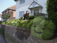Shear genius! Meet the amateur topiarists who devote years to crafting incredible sculptures from their garden hedges.