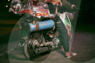 Masters of packing: the mobile balancing act soon to be banned in Hanoi, Vietnam.