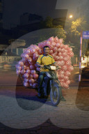 Masters of packing: the mobile balancing act soon to be banned in Hanoi, Vietnam.