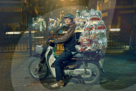 Masters of packing: the mobile balancing act soon to be banned in Hanoi, Vietnam.