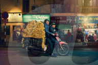 Masters of packing: the mobile balancing act soon to be banned in Hanoi, Vietnam.