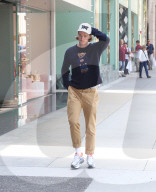 PREMIUM EXCLUSIVE Patrick Schwarzenegger Confidently Rocks A Teddy Bear Sweater In Beverly Hills
