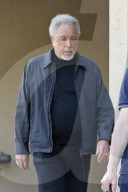Tom Jones steps out with a nasty looking bruise on his face as he takes a break during his world concert tour.