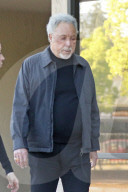 Tom Jones steps out with a nasty looking bruise on his face as he takes a break during his world concert tour.