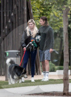 Ireland Baldwin and her boyfriend singer/songwriter Corey Harper are seen leaving a park with her dog in Los Angeles.