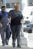 Queen Latifah grabs coffee and a bite to eat from Starbucks after emerging from a workout in Beverly Hills.