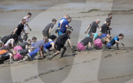 The Maldon Mud Race is an annual fun race held in spring at Promenade Park in Maldon, Essex, England, in which entrants compete to complete a 500 metres dash, in thick mud, over the bed of the River Blackwater.