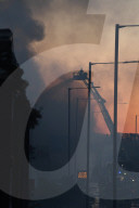London warehouse fire: rush-hour warning after North Circular closed.