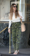 A smiling Sofia Vergara is seen leaving Saks Fifth Avenue in Beverly Hills after doing some shopping.