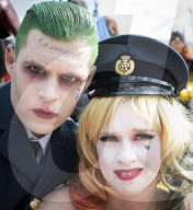 Cos Play enthusiasts arrive at Comic Con London dressed in the favourite cos play costumes.