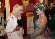 PEOPLE - Prinz Charles und Camilla hinter Masken am Elephant Family Animal Ball