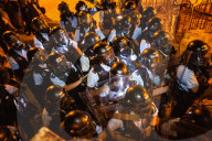 Hong Kongers storm the Legislature, Police retaliate with tear gas