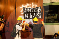Hong Kongers storm the Legislature, Police retaliate with tear gas