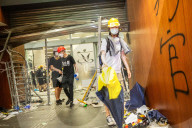 Hong Kongers storm the Legislature, Police retaliate with tear gas