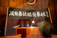 Hong Kongers storm the Legislature, Police retaliate with tear gas