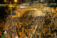 Hong Kongers storm the Legislature, Police retaliate with tear gas