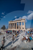 Tourist At Acropolis Hill And Parthenon In Athens 