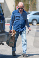 Paul Hogan, 79, is seen leaving Whole Foods grocery store in Los Angeles.
