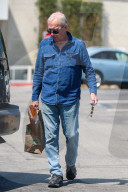 Paul Hogan, 79, is seen leaving Whole Foods grocery store in Los Angeles.