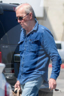 Paul Hogan, 79, is seen leaving Whole Foods grocery store in Los Angeles.
