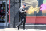 Benji Madden is seen busy on his phone as he is running errands in Los Angeles.