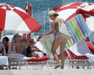 Original member of English pop band Duran Duran, Roger Taylor, was pictured enjoying a beach day in Miami Beach with his beautiful wife, Peruvian national Gisella Bernales, and their adorable 8-year-old son Julian Roger. 