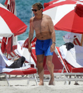 Original member of English pop band Duran Duran, Roger Taylor, was pictured enjoying a beach day in Miami Beach with his beautiful wife, Peruvian national Gisella Bernales, and their adorable 8-year-old son Julian Roger. 
