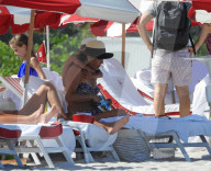 Original member of English pop band Duran Duran, Roger Taylor, was pictured enjoying a beach day in Miami Beach with his beautiful wife, Peruvian national Gisella Bernales, and their adorable 8-year-old son Julian Roger. 