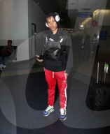 PREMIUM EXCLUSIVE YBN Cordae Lands At LAX After Dropping New RNP Single