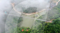 FEATURE - In luftiger Höhe: Glasbrücke in Ningqiang
