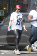 Blac Chyna looks fresh-faced and happy as she emerges from a four-hour visit to a laser center in LA. 