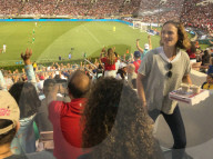 Hollywood actress Natalie Portman indulges in some fast food at womenÍs soccer game in Pasadena. 