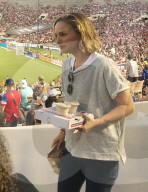 Hollywood actress Natalie Portman indulges in some fast food at womenÍs soccer game in Pasadena. 
