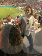 Hollywood actress Natalie Portman indulges in some fast food at womenÍs soccer game in Pasadena. 