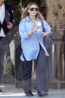 Mary-Kate and Ashley Olsen step out for an afternoon stroll after a high-powered meeting in Los Angeles
