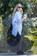 Mary-Kate and Ashley Olsen step out for an afternoon stroll after a high-powered meeting in Los Angeles