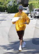 Justin Bieber stop in Beverly Hills to give a way his clothing brand stickers