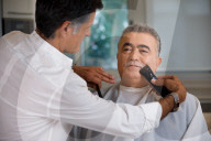 Israeli Labor leader Amir Peretz, ceremoniously shaves mustache