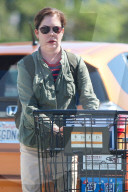 Lara Flynn Boyle leaves her local supermarket after buying a bottle of vodka, orange juice and two teriyaki bowls