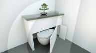 FEATURE - Klapptoilette macht das Beste aus begrenztem Platz im kleinsten Raum des Hauses