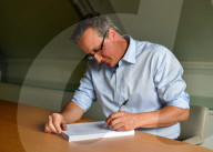 David Cameron writing his book