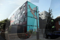 Families living in shipping containers
